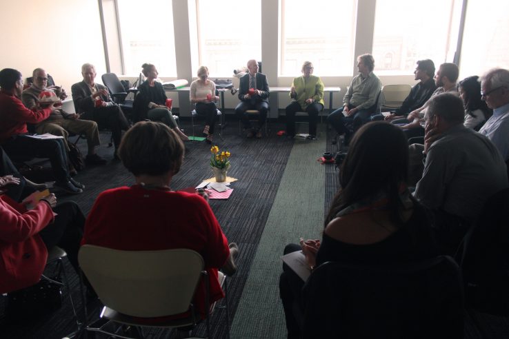 participants of vernissage health gathered in a circle for discussion