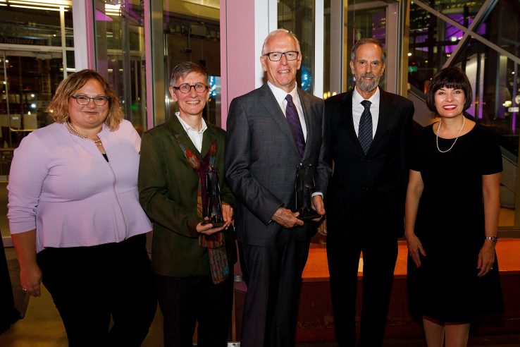 Ross Baker centre with minister and other award recipients at award ceremony