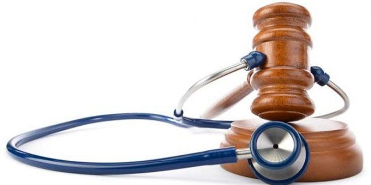 Stethoscope and gavel intertwined