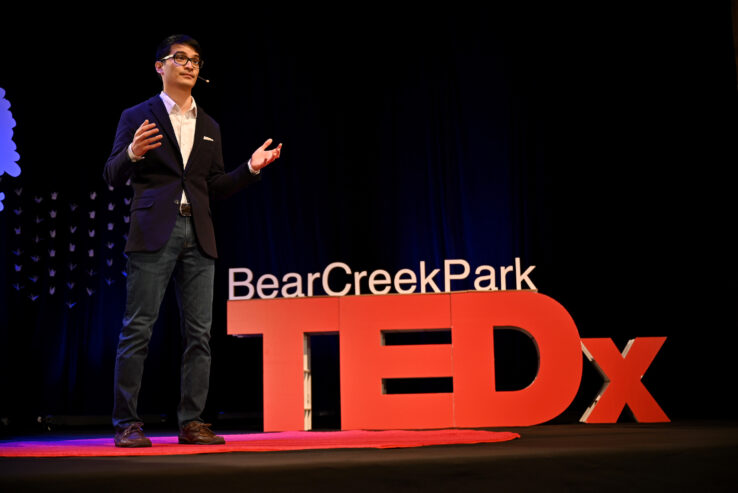 Dr. Brandon Tang giving a TEDx talk