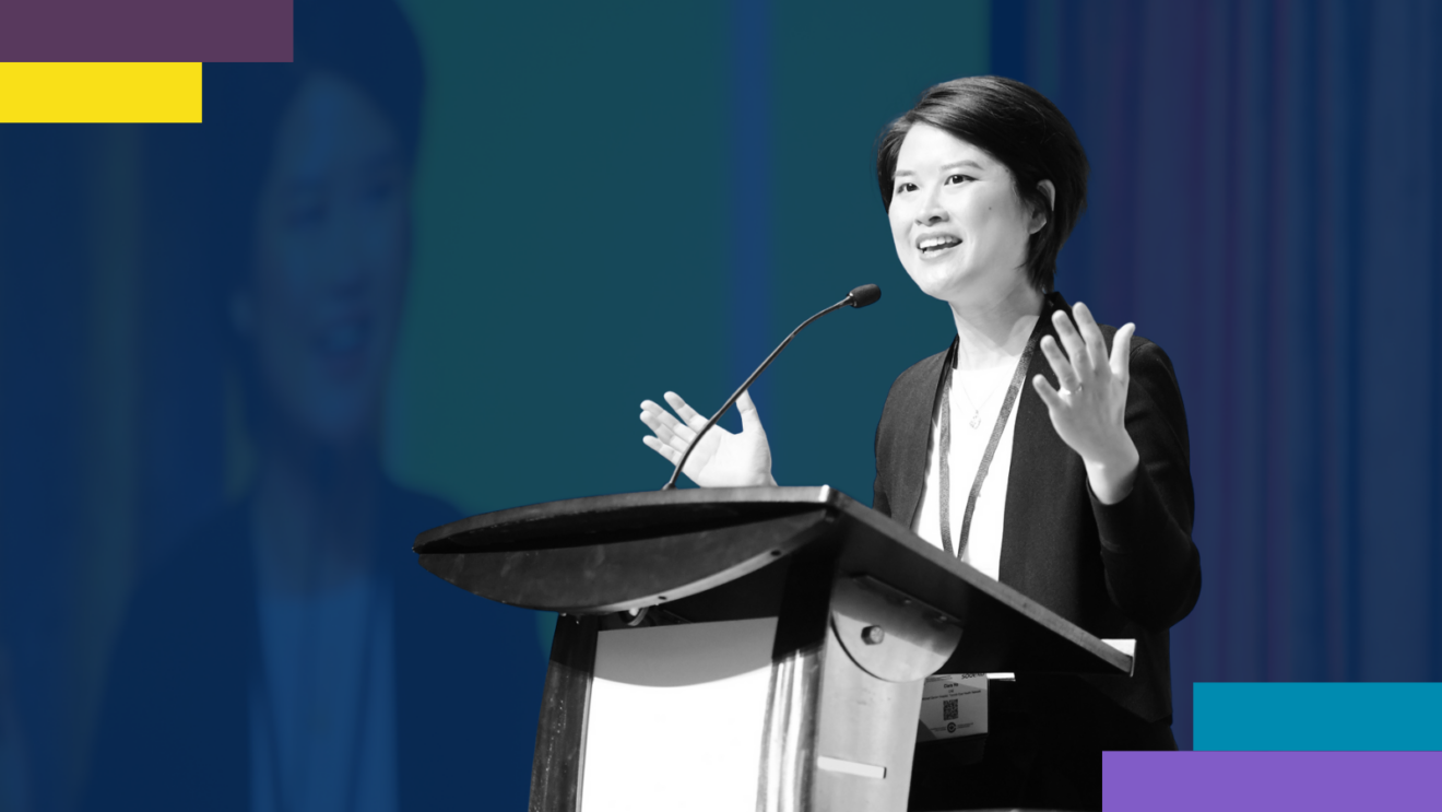Clara Ho delivering a speech on equity-driven healthcare leadership at the 2025 CCHL National Conference, standing at a podium with a projected image behind her.